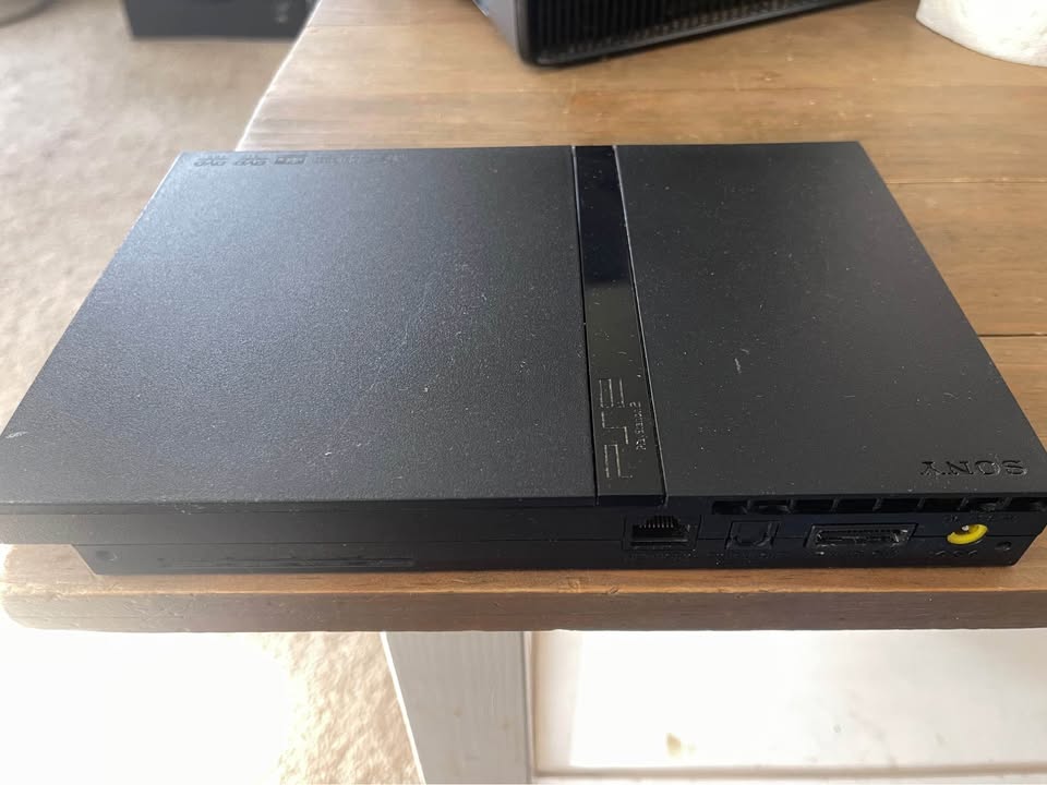 PS2 Console and 10 games