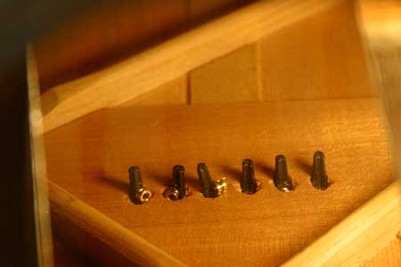 Acoustic Bridge Plates: The Hidden Wear Part